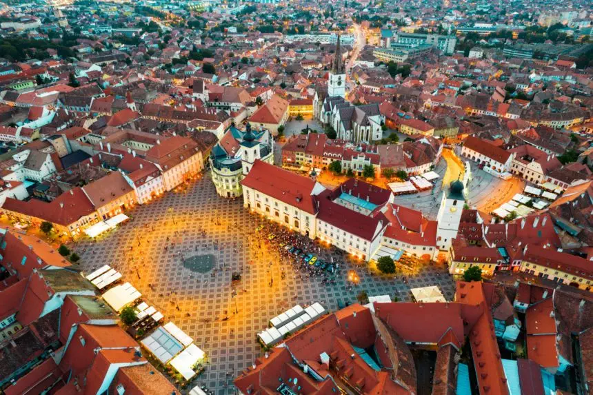 Aerial drone view of the Historic Centre of Sibiu at evening, Romania
