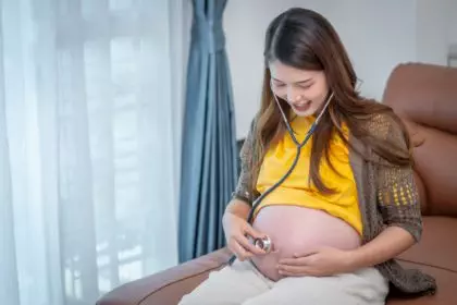 pregnant woman Listen to your babys voice with stethoscope