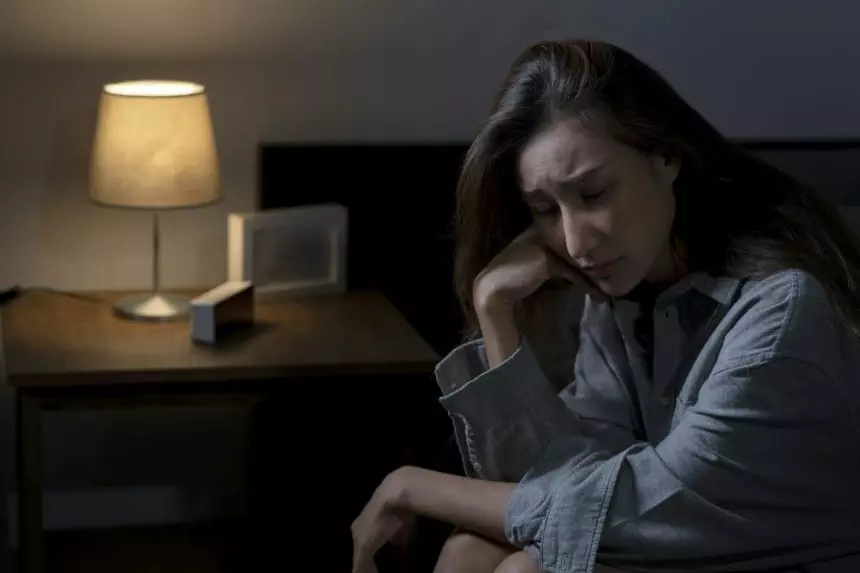 Woman suffering from depression and insomnia