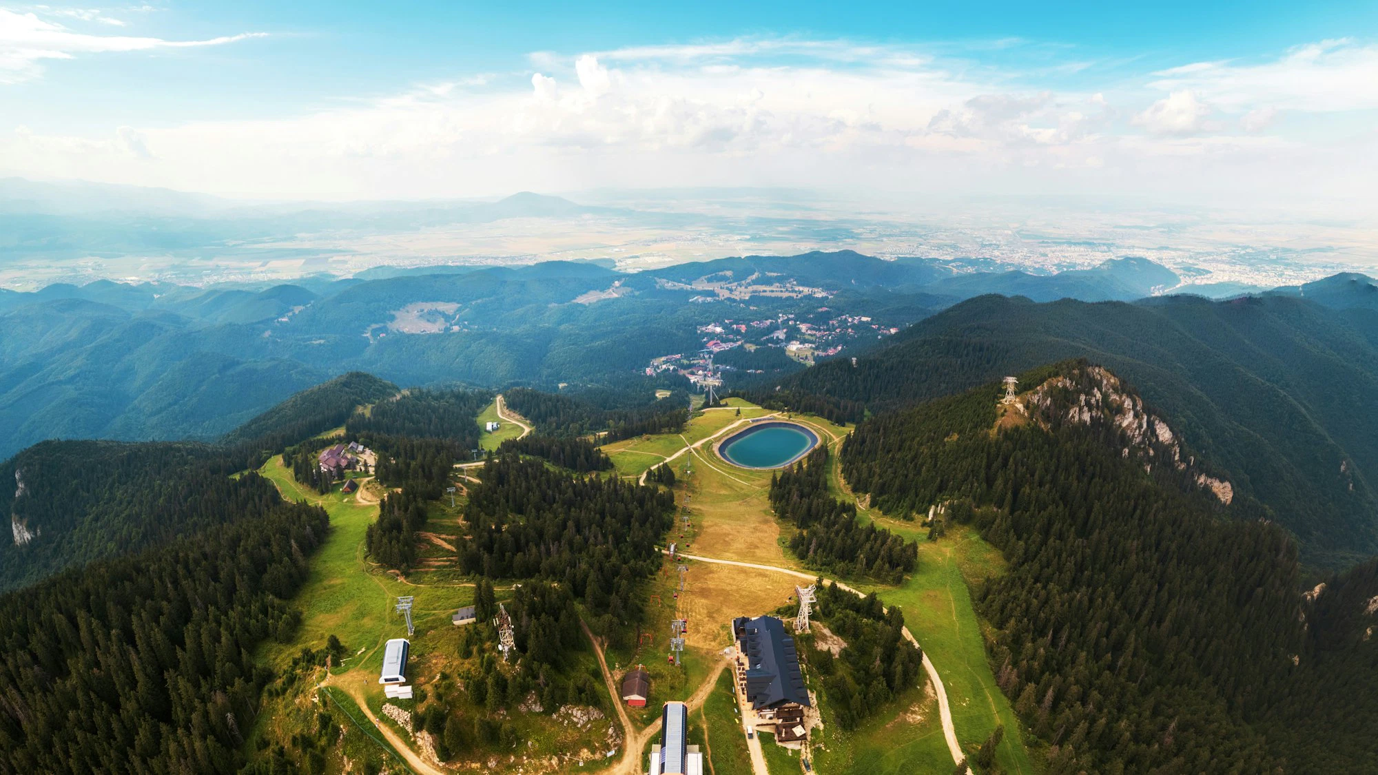 Aerial drone panoramic view of Poiana Brasov, Romania