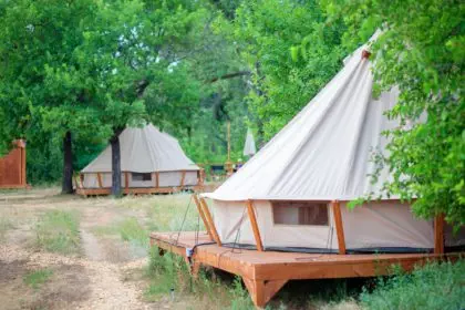 View of modern camping tents in the glamping area