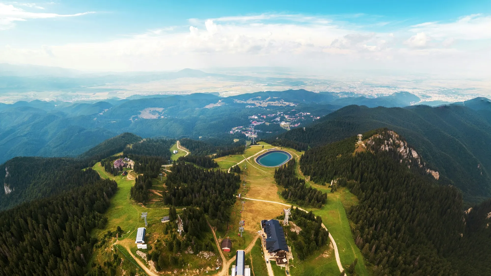 Aerial drone panoramic view of Poiana Brasov, Romania