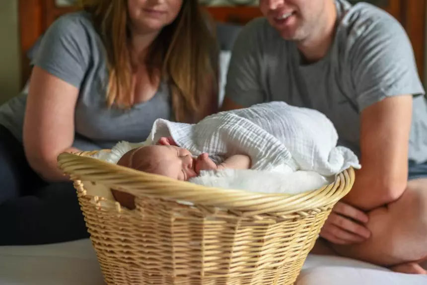 Proud parents with brand new baby