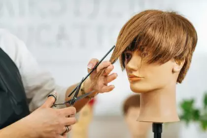 Haircutting Education - Hairstylist Explaining Haircutting Techniques