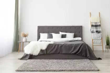 Cozy bedroom in scandinavian minimalist style, panorama